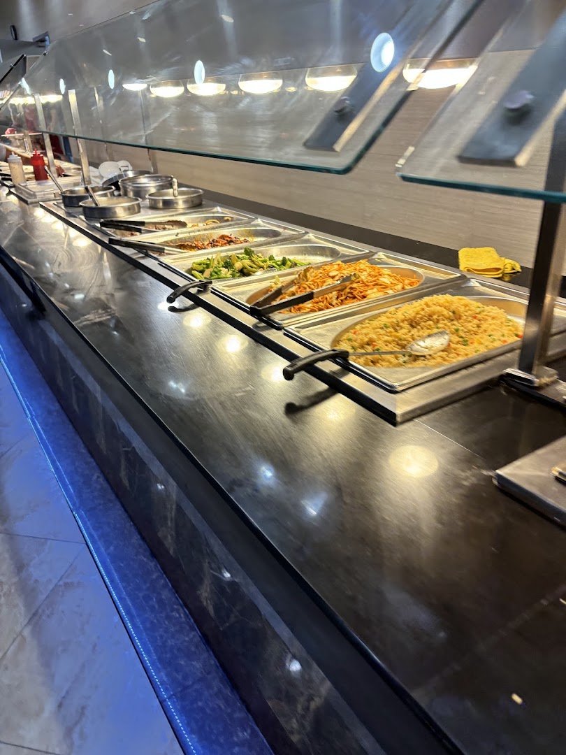 Takeaway containers arranged near buffet selections